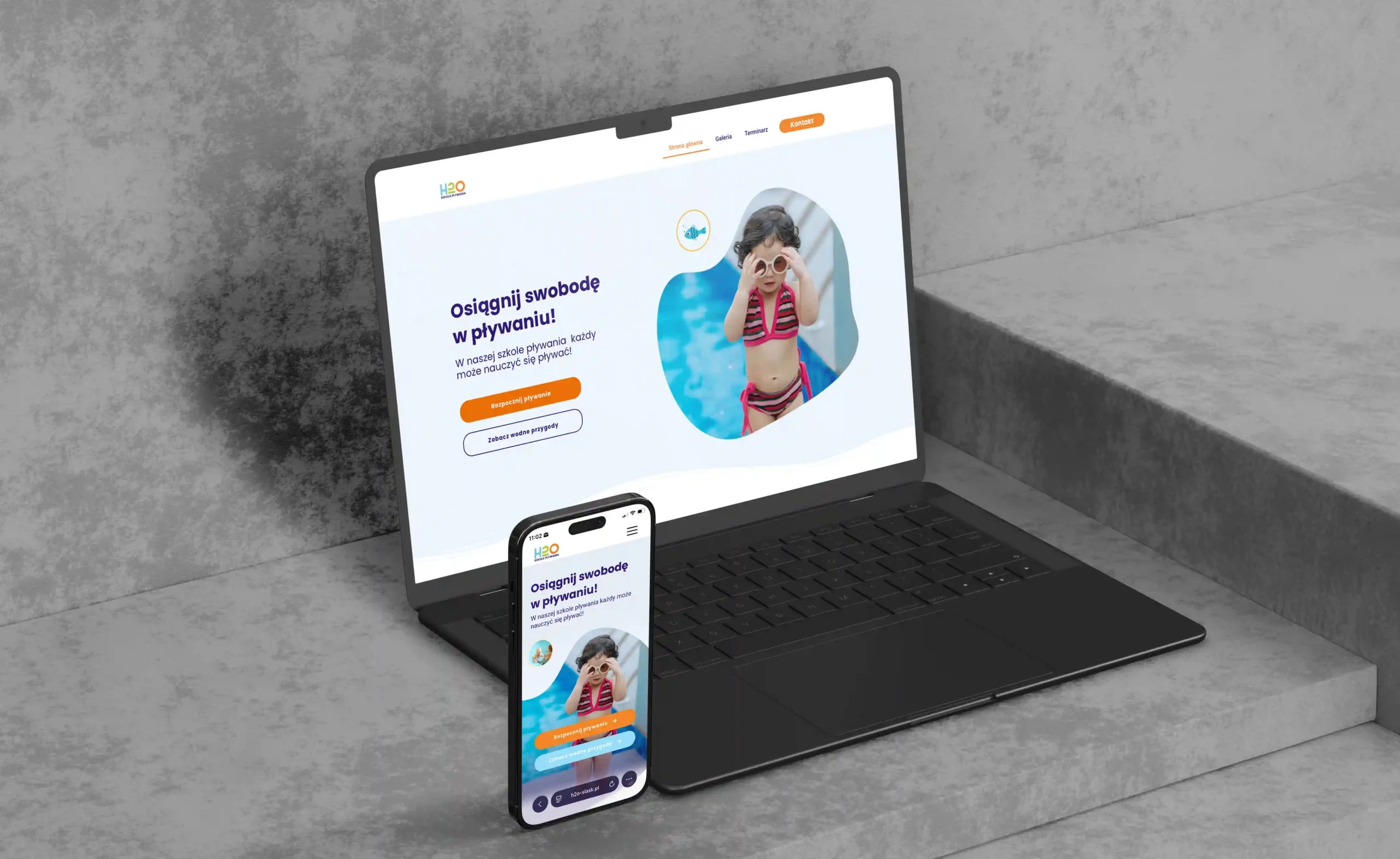 Strona internetowa pokazana na laptopie oraz telefonie