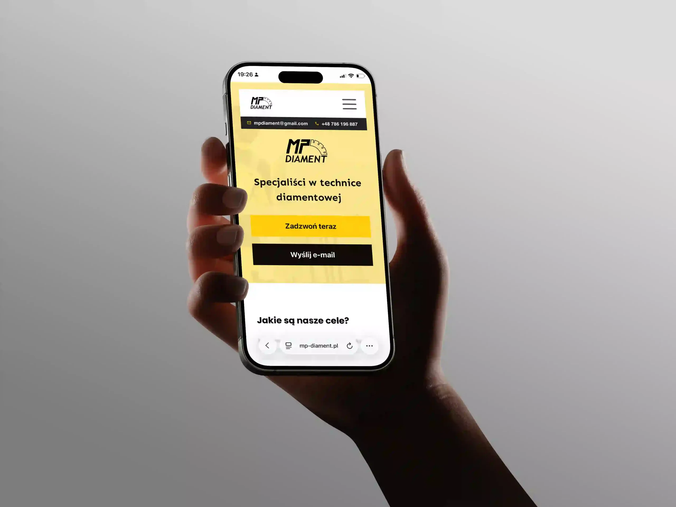 Responsywna strona mp diament pokazana na telefonie - wykonana przez magma studio